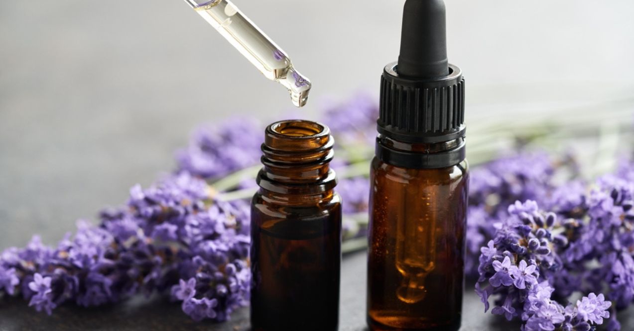 Two small amber bottles of lavender essential oil