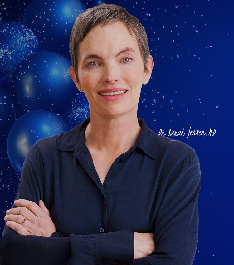 Dr. Sarah Jensen with blue balloons for Pureance 5th birthday