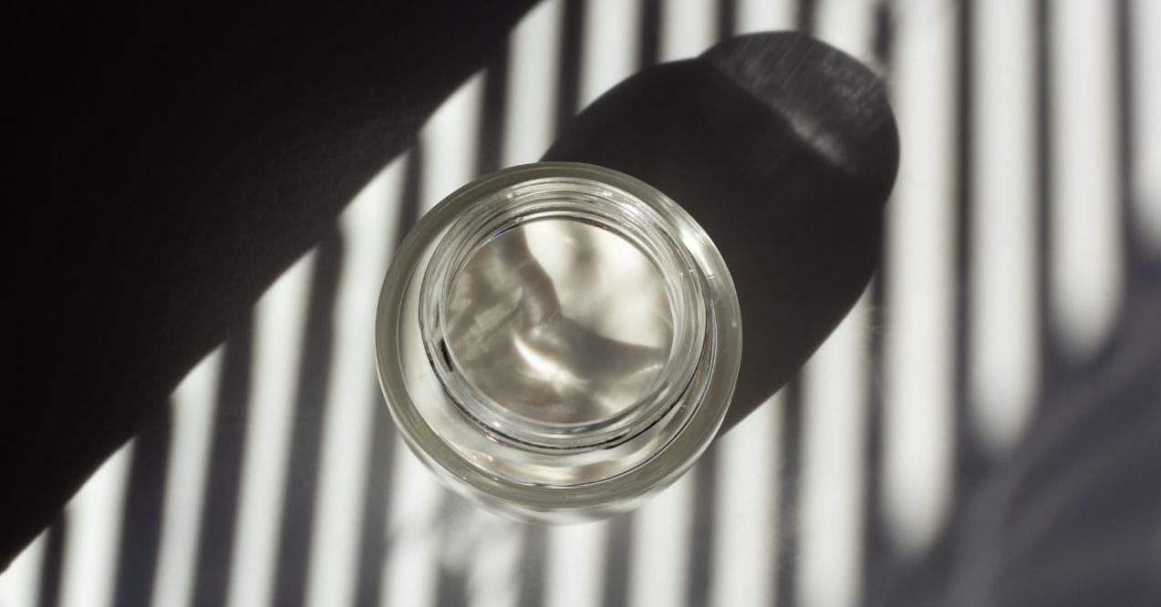 Minimalistic glass jar with soft shadows