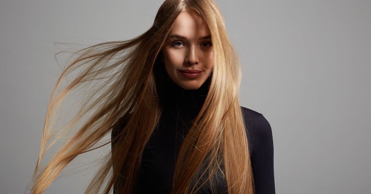 Woman with long healthy blonde hair